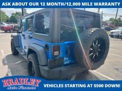 Used 2015  Jeep Wrangler Unlimited 4WD 4dr Sport at Bradley Auto Finance near Hudson&comma; NH
