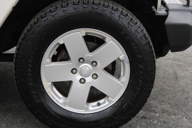 Used 2010  Jeep Wrangler Unlimited 4d Convertible 4WD Sahara at Warner Motors near East Orange&comma; NJ