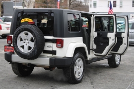 Used 2010  Jeep Wrangler Unlimited 4d Convertible 4WD Sahara at Warner Motors near East Orange&comma; NJ