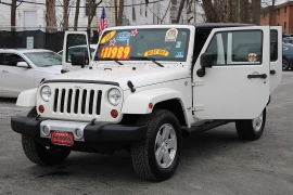 Used 2010  Jeep Wrangler Unlimited 4d Convertible 4WD Sahara at Warner Motors near East Orange&comma; NJ