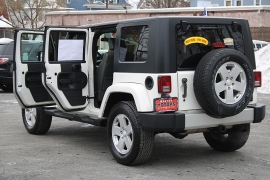 Used 2010  Jeep Wrangler Unlimited 4d Convertible 4WD Sahara at Warner Motors near East Orange&comma; NJ