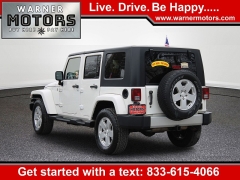 Used 2010  Jeep Wrangler Unlimited 4d Convertible 4WD Sahara at Warner Motors near East Orange&comma; NJ