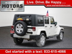 Used 2010  Jeep Wrangler Unlimited 4d Convertible 4WD Sahara at Warner Motors near East Orange&comma; NJ
