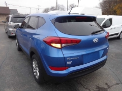 Used 2018  Hyundai Tucson 4d SUV AWD SE at Rose Automotive near Hamilton&comma; OH