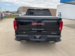 Used 2021  GMC Sierra 1500 4WD Crew Cab 147" AT4 at Ollenburg Motors near Garner, IA