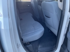 Used 2013  Ram 1500 4WD Quad Cab SLT at Ollenburg Motors near Garner, IA