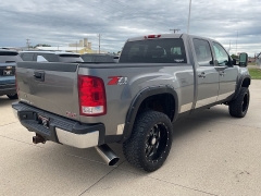 Used 2009  GMC Sierra 2500 4WD Crew Cab SLT at Ollenburg Motors near Garner&comma; IA