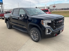 Used 2021  GMC Sierra 1500 4WD Crew Cab 147" AT4 at Ollenburg Motors near Garner, IA