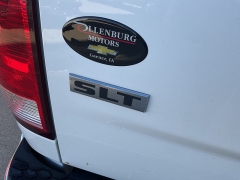 Used 2013  Ram 1500 4WD Quad Cab SLT at Ollenburg Motors near Garner, IA