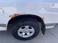 Used 2013  Ram 1500 4WD Quad Cab SLT at Ollenburg Motors near Garner, IA