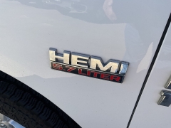 Used 2013  Ram 1500 4WD Quad Cab SLT at Ollenburg Motors near Garner, IA