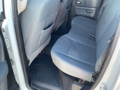 Used 2013  Ram 1500 4WD Quad Cab SLT at Ollenburg Motors near Garner, IA