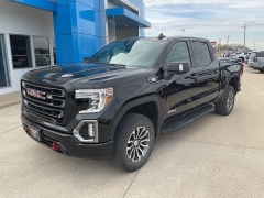 Used 2021  GMC Sierra 1500 4WD Crew Cab 147" AT4 at Ollenburg Motors near Garner, IA