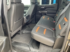 Used 2021  GMC Sierra 1500 4WD Crew Cab 147" AT4 at Ollenburg Motors near Garner, IA