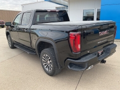 Used 2021  GMC Sierra 1500 4WD Crew Cab 147" AT4 at Ollenburg Motors near Garner, IA