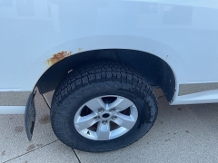 Used 2013  Ram 1500 4WD Quad Cab SLT at Ollenburg Motors near Garner, IA