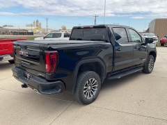 Used 2021  GMC Sierra 1500 4WD Crew Cab 147" AT4 at Ollenburg Motors near Garner, IA