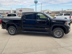 Used 2021  GMC Sierra 1500 4WD Crew Cab 147" AT4 at Ollenburg Motors near Garner, IA