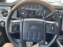 Used 2014  Ford Super Duty F-250 4WD Crew Cab Lariat at Ollenburg Motors near Garner&comma; IA