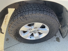 Used 2013  Ram 1500 4WD Quad Cab SLT at Ollenburg Motors near Garner, IA