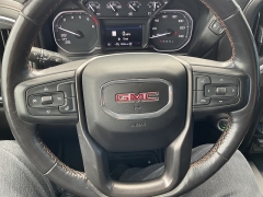Used 2021  GMC Sierra 1500 4WD Crew Cab 147" AT4 at Ollenburg Motors near Garner, IA