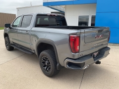 Used 2021 GMC Sierra 1500 4WD Crew Cab 147" AT4 at Ollenburg Motors near Garner, IA