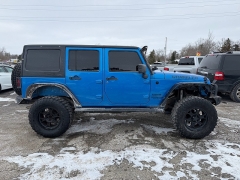 Used 2015  Jeep Wrangler Unlimited 4d Convertible Sport at Maxx Loans near St&period; Adrian&comma; MI
