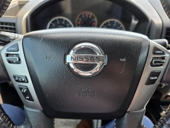 Used 2015 Nissan Titan 4WD Crew Cab PRO-4X at Maxx Loans near St. Adrian, MI