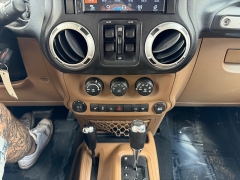 Used 2011  Jeep Wrangler Unlimited 4d Convertible Sahara at House of Carz near Rochester&comma; IN