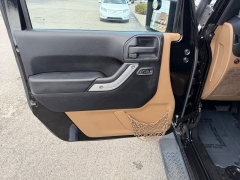 Used 2011  Jeep Wrangler Unlimited 4d Convertible Sahara at House of Carz near Rochester&comma; IN