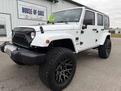 2016 Jeep Wrangler Unlimited 4d Convertible Sahara at House of Carz near Rochester, IN