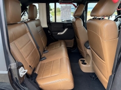 Used 2011  Jeep Wrangler Unlimited 4d Convertible Sahara at House of Carz near Rochester&comma; IN