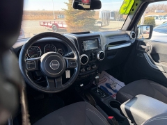 Used 2015  Jeep Wrangler Unlimited 4WD 4dr Sahara at House of Carz near Rochester&comma; IN