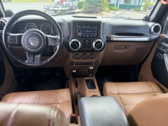Used 2011  Jeep Wrangler Unlimited 4d Convertible Sahara at House of Carz near Rochester&comma; IN