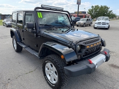 Used 2011  Jeep Wrangler Unlimited 4d Convertible Sahara at House of Carz near Rochester&comma; IN