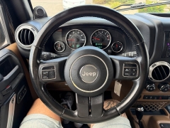 Used 2011  Jeep Wrangler Unlimited 4d Convertible Sahara at House of Carz near Rochester&comma; IN