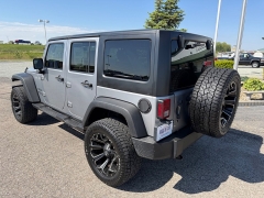 Used 2016  Jeep Wrangler Unlimited 4d Convertible Sport at House of Carz near Rochester&comma; IN