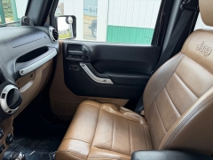 Used 2011  Jeep Wrangler Unlimited 4d Convertible Sahara at House of Carz near Rochester&comma; IN