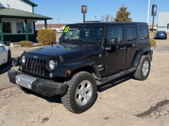 Used 2015  Jeep Wrangler Unlimited 4WD 4dr Sahara at House of Carz near Rochester&comma; IN