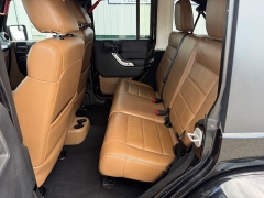 Used 2011  Jeep Wrangler Unlimited 4d Convertible Sahara at House of Carz near Rochester&comma; IN
