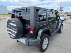 Used 2011  Jeep Wrangler Unlimited 4d Convertible Sahara at House of Carz near Rochester&comma; IN