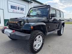  2011 Jeep Wrangler Unlimited 4d Convertible Sahara at House of Carz near Rochester&comma; IN