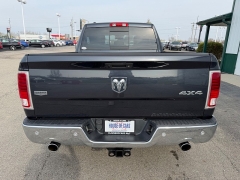 Used 2016  Ram 1500 4WD Quad Cab Laramie at House of Carz near Rochester&comma; IN