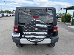 Used 2011  Jeep Wrangler Unlimited 4d Convertible Sahara at House of Carz near Rochester&comma; IN