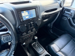 Used 2012  Jeep Wrangler Unlimited 4d Convertible Altitude at House of Carz near Rochester&comma; IN