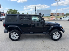 Used 2011  Jeep Wrangler Unlimited 4d Convertible Sahara at House of Carz near Rochester&comma; IN