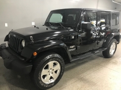 Used 2009  Jeep Wrangler Unlimited 4d Convertible 4WD Sahara at Carolina Family Motors near Mooresville, NC