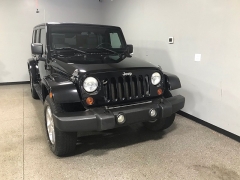 Used 2009  Jeep Wrangler Unlimited 4d Convertible 4WD Sahara at Carolina Family Motors near Mooresville, NC