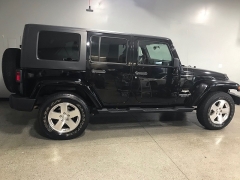 Used 2009  Jeep Wrangler Unlimited 4d Convertible 4WD Sahara at Carolina Family Motors near Mooresville, NC