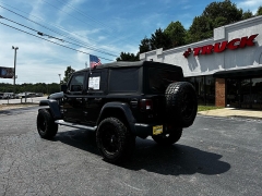 Used 2020  Jeep Wrangler Unlimited 4d SUV 4WD Sahara at The Truck Farm near Easley&comma; SC